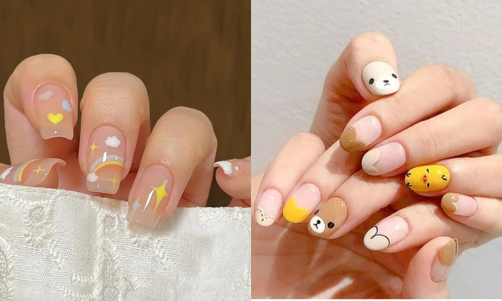 Mẫu nail ngắn màu nude và vàng với hình mặt cười, trái tim và họa tiết dễ thương