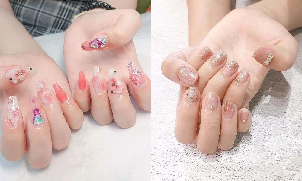 Mẫu nail đẹp màu hồng pastel với họa tiết hoa, đá và charm nhiều màu
