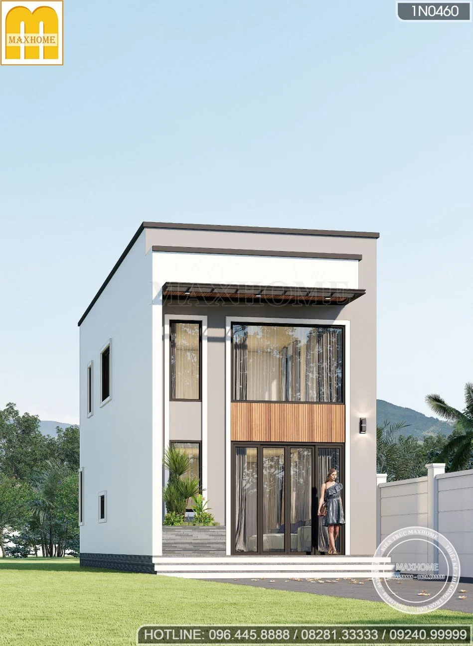 Mẫu nhà gác lửng đẹp hiện đại 2 tầng với kính lớn và gỗ, thiết kế MAXHOME.