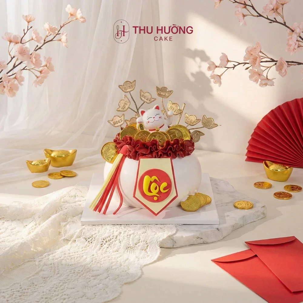 Bánh sinh nhật trang trí đồng tiền vàng